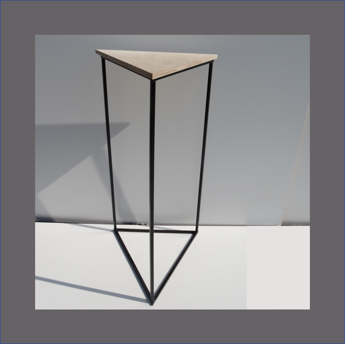 triangle-cocktail-table